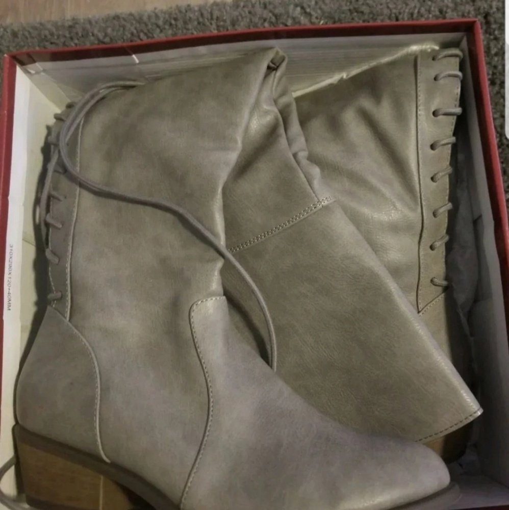 Gray knee high boots